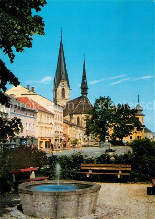 Bad Leonfelden Ortspartie mit Brunnen und Kirche