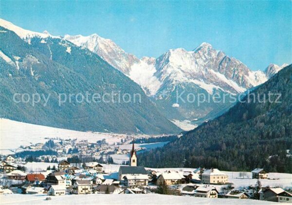 Oberolang Pustertal Gesamtansicht mit Alpenpanorama im Wint