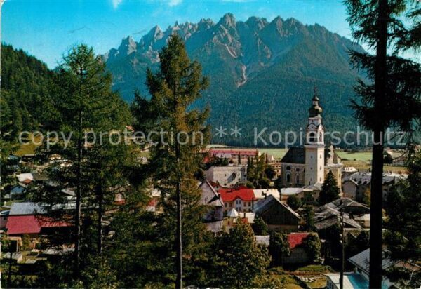 Dobbiaco Pustertal Suedtirol Ortsmotiv mit Kirche Dolomiten