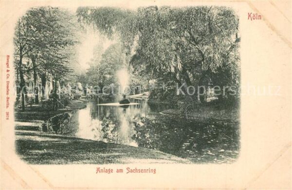 Koeln Rhein Anlage am Sachsenring Park Teich Fontän