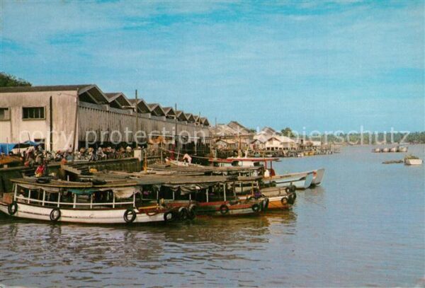 Kuala Terengganu fishermen bring boats