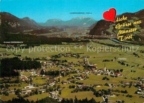 Muenster Tirol Fliegeraufnahme mit Kaisergebirge