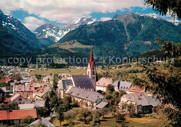 Koetschach-Mauthen Kaernten Ortsansicht mit Kirche Alpenpanorama So