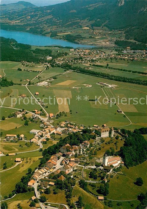 Gruyeres FR au fond Broc et Lac de la Gruyere vue a