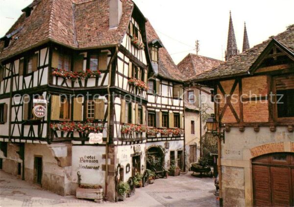 Obernai Bas Rhin Altes blumengeschmücktes Fachwerkhaus