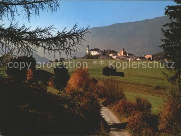 Lajen Bozen Ansicht vom Waldrand aus Herbststimmung