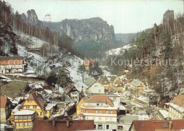 Rathen Saechsische Schweiz Teilansicht im Winter Felsen Elbsandste