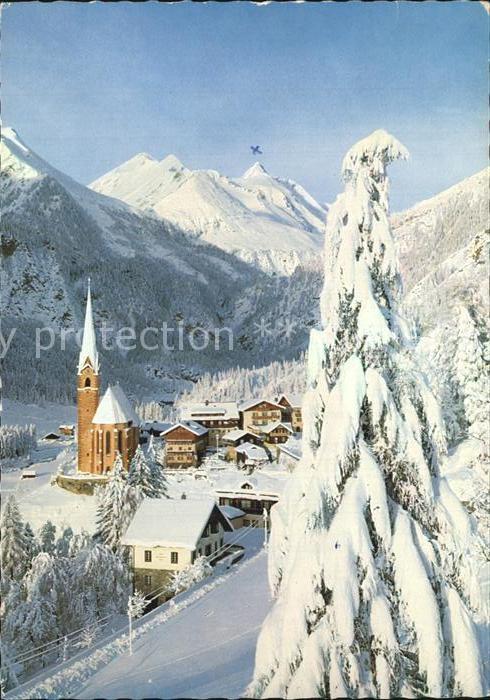 Heiligenblut Kaernten Teilansicht mit Kirche und Grossklockbe