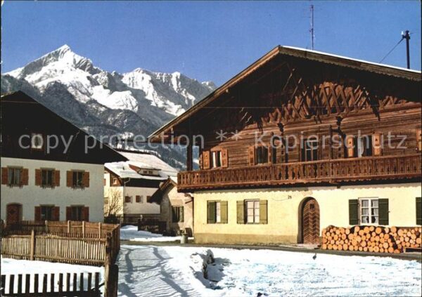 Garmisch-Partenkirchen Ortspartie im Winter gegen Alpspitze We