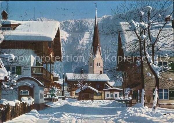 Bayrischzell Dorfpartie Wintersportplatz Kirche Wint