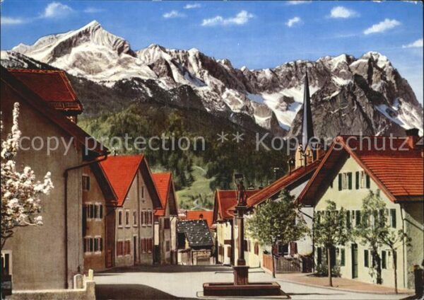 Garmisch-Partenkirchen Floriansplatz Brunnen Kirche Alpenblick