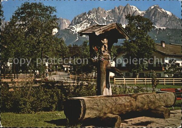St Johann Tirol Malerischer Dorfbrunnen am Wilden Kaise