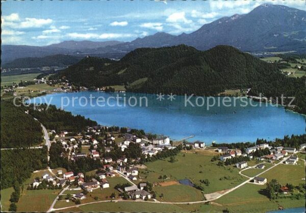 Seelach Klopeinersee mit Petzen Georgiberg und Unterburg Fli