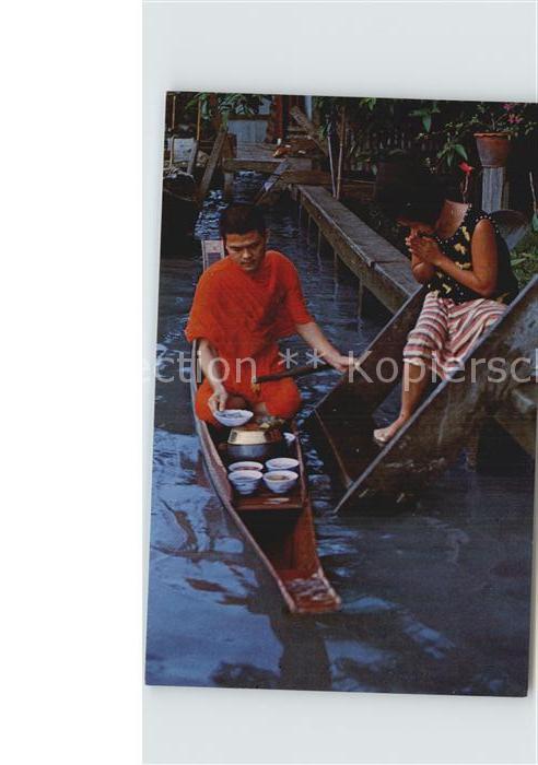 Thailand Thai People offer food to Buddhist