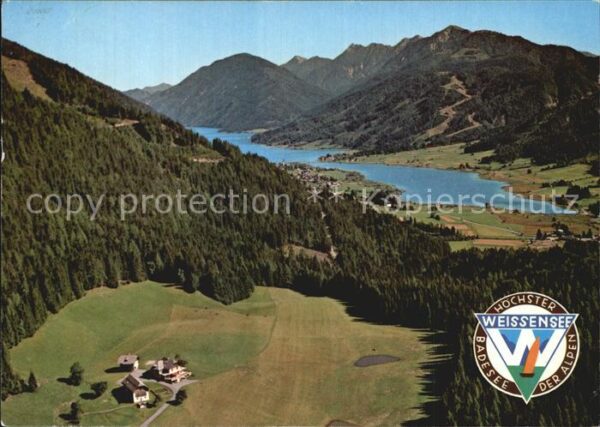 Weissensee Kaernten mit Tschabitsch Alm Fliegeraufnahme
