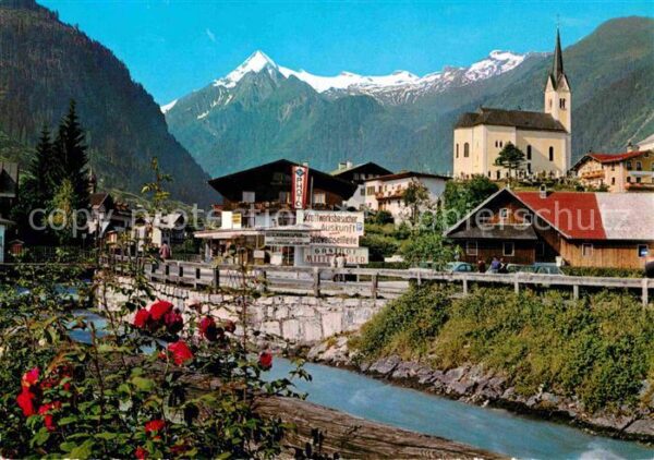 Kaprun Ortspartie am Fluss Kirche Blick zum Ki