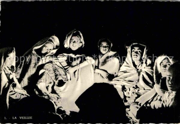 Sahara Young men sitting up by the Fire