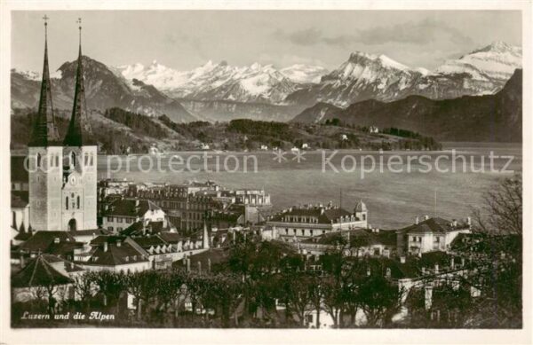 Luzern  LU mit Kirche und den Alpen