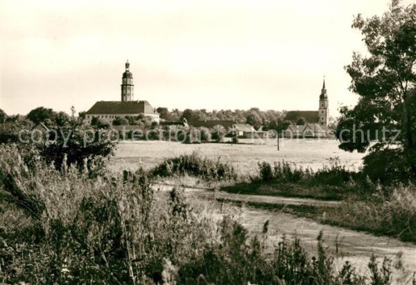 Reinharz Duebener Heide Blick über die Wiesen Ortsansicht mit K