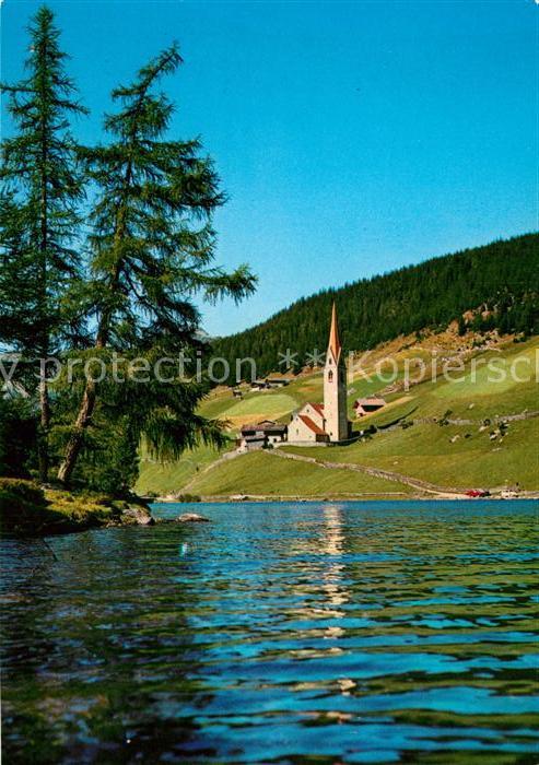 Sarentino Bozen Blick über den See zum Ort Kirche Streu