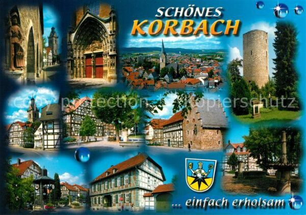 Korbach Statue Kirchenportal Stadtblick Turm Fa