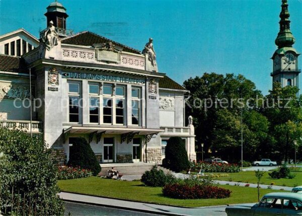Klagenfurt Woerthersee Stadttheater mit Stadtpfarrturm
