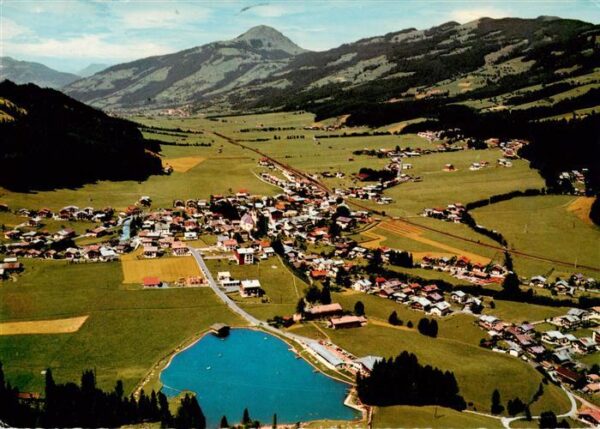 Kirchberg Tirol AT Panorama Badesee Blick gegen Hohe Salve Kitzbueheler Alpen