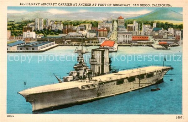 San Diego California US Navy Aircraft Carrier at anchor at foot of Broadway