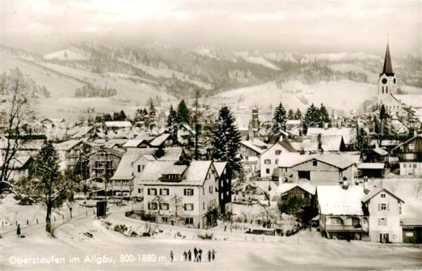 Oberstaufen Ortsansicht mit Kirche Winterpanorama