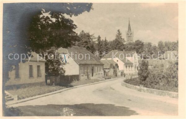 Feldberg Mecklenburg Bad Dorfstrasse mit Kirche