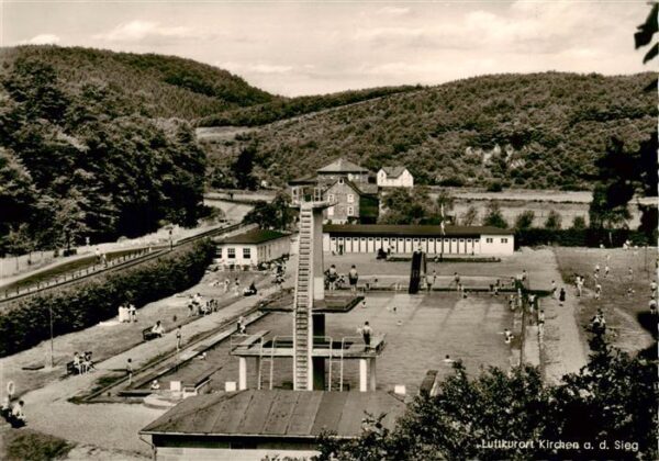 Wehbach Schwimmbad mit Sprungturm Rutschbahn und Liegewiese