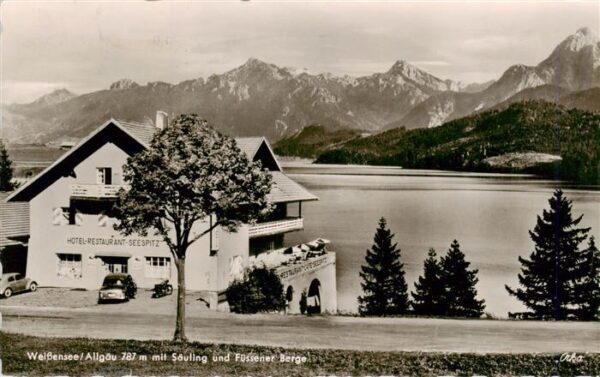 Weissensee Fuessen Hotel Seespitz mit Saeuling und Fuessener Berge