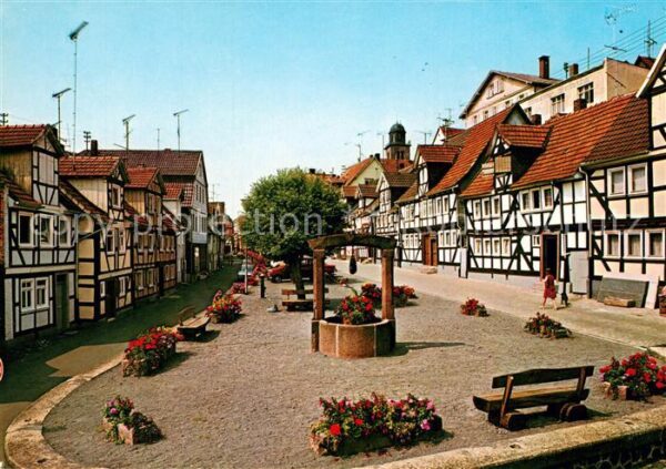 Lauterbach Hessen Am oberen Graben Fachwerkhaeuser mit Baumeister-Jockel-Brunnen