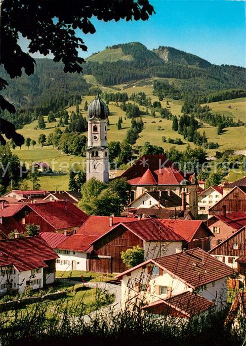 Nesselwang Ortsansicht mit Kirche Blick zur Alpspitze Allgaeuer Alpen