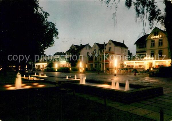 Timmendorfer Strand Kurpromenade am Abend Wasserspiele