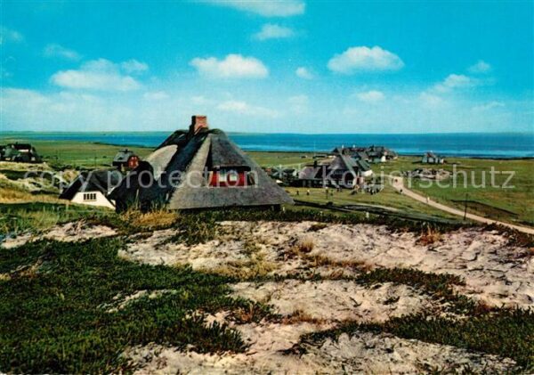 Insel Sylt Friesenhaeuser am Watt