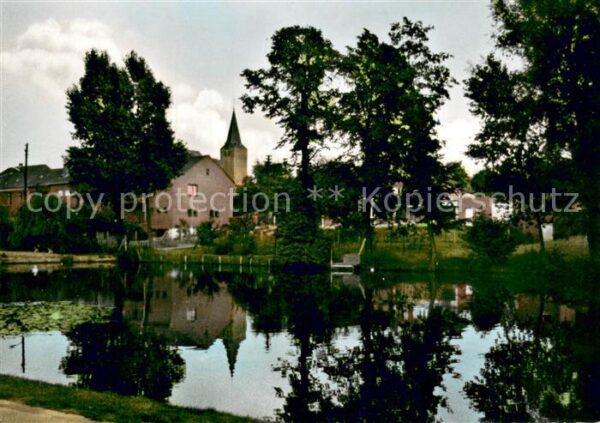 Niederkruechten Dorfweiher mit Kirche
